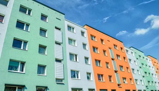 How will the Building Safety Act 2022 impact buildings completed before the Act comes into force?