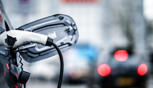 Who bears the risk of the UK's EV charging shortfall?